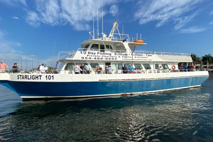 a small boat in a large body of water