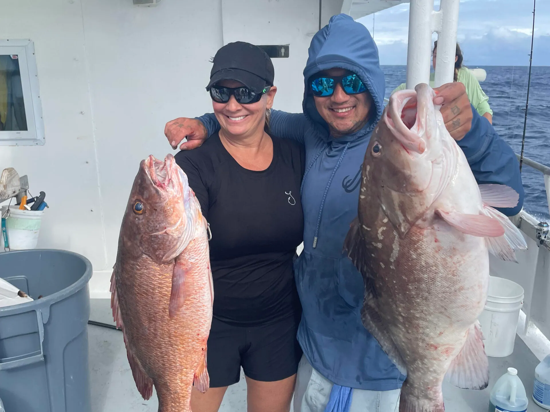 a person holding a fish